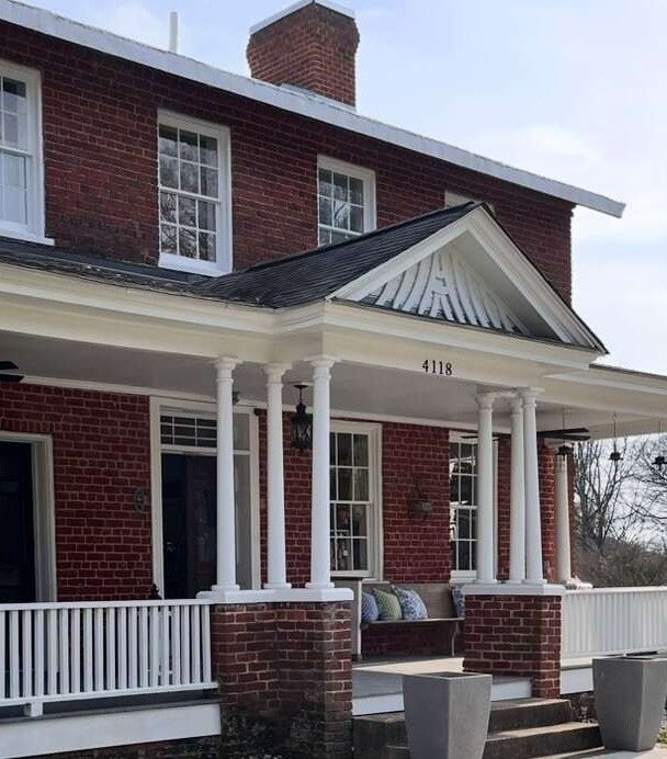 Martin's Mercantile Front Porch with Pillows on Bench