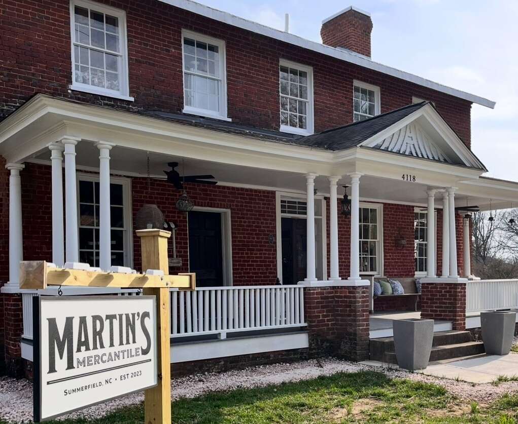 Martin's Mercantile Sign & Front Porch with Pillows on Bench